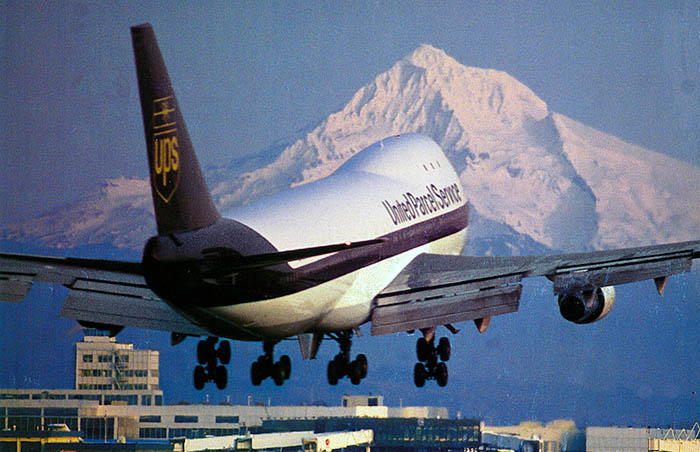 A UPS B747 landing at Portland, Oregon.  Mount Hood [11,500'] in the background